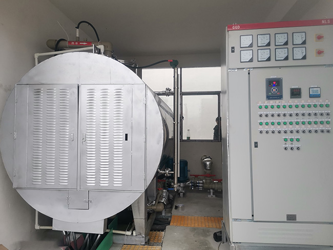 湖南某电解钨钴公司采用常压式电加热锅炉，耐腐蚀换热系统设备